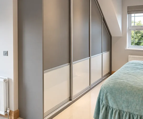 Dust grey and bright white glass angled wardrobe fitted in Northern Ireland